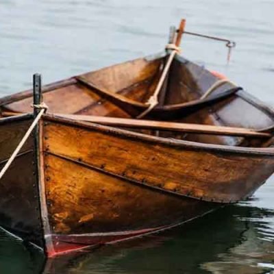 The Versatility of Wooden Row Boats