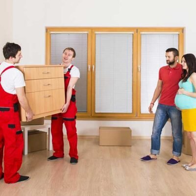 Movers-in-new-house-with-young