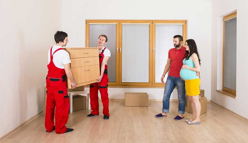 Movers-in-new-house-with-young