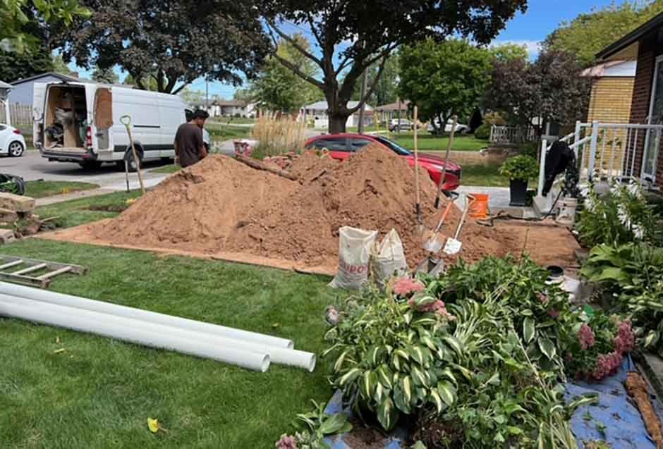 A-pile-of-dirt-in-a-residential-backyard